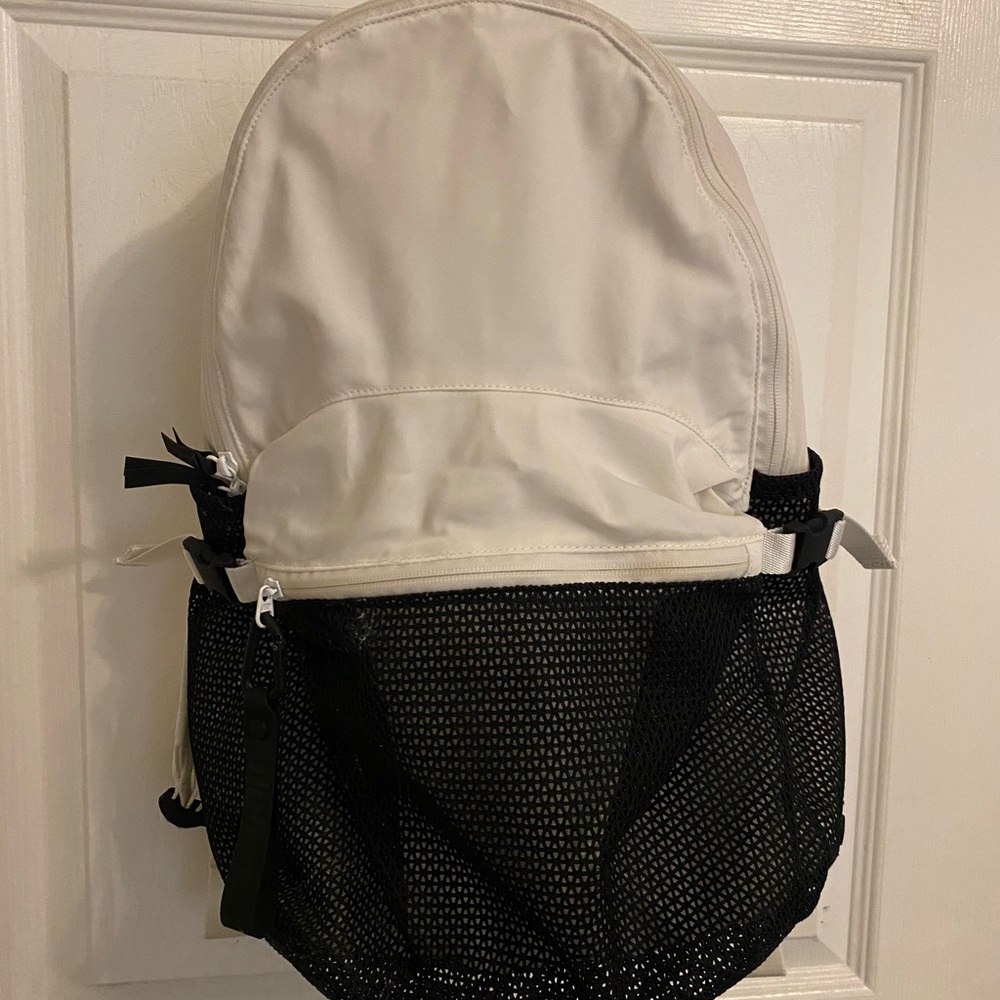 White Lululemon Backpack with mesh pockets